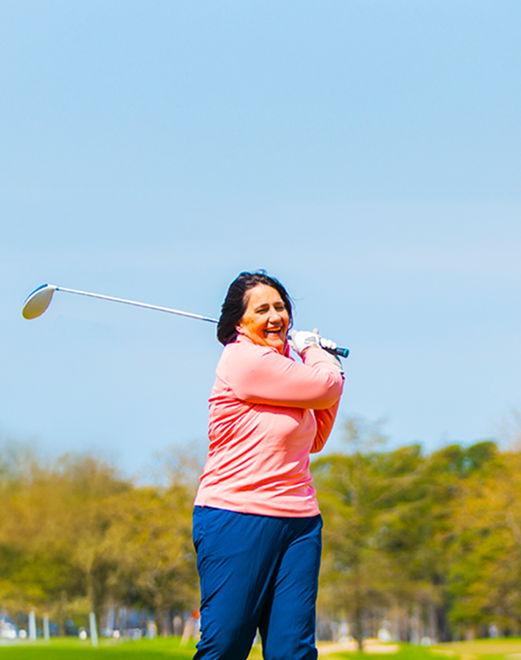Woman playing golf